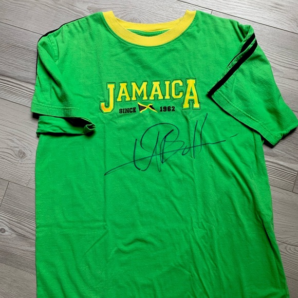 Autographed Usain Bolt t shirt. Size M